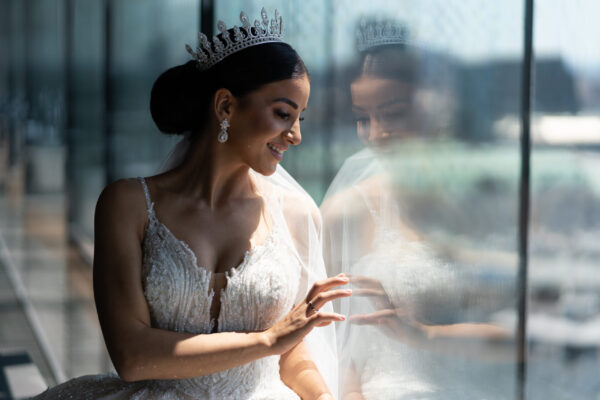 bride-posing-next-to-a-panorama-window-in-a-high-r-2025-03-06-05-01-05-utc